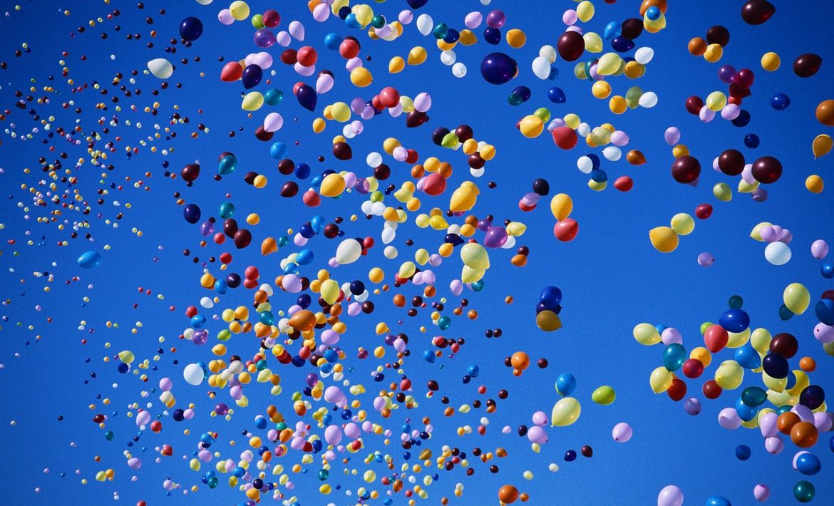 Various color balloons in the sky