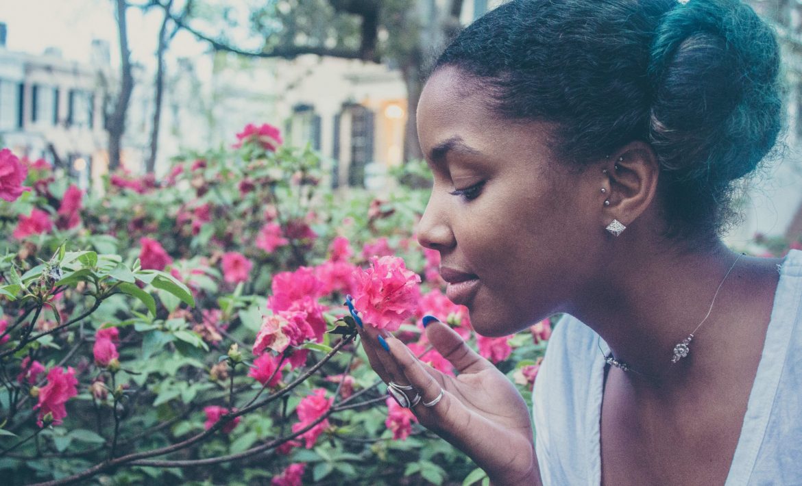 Woman Smelling the Roses - Do You Neglect Caring For Yourself?