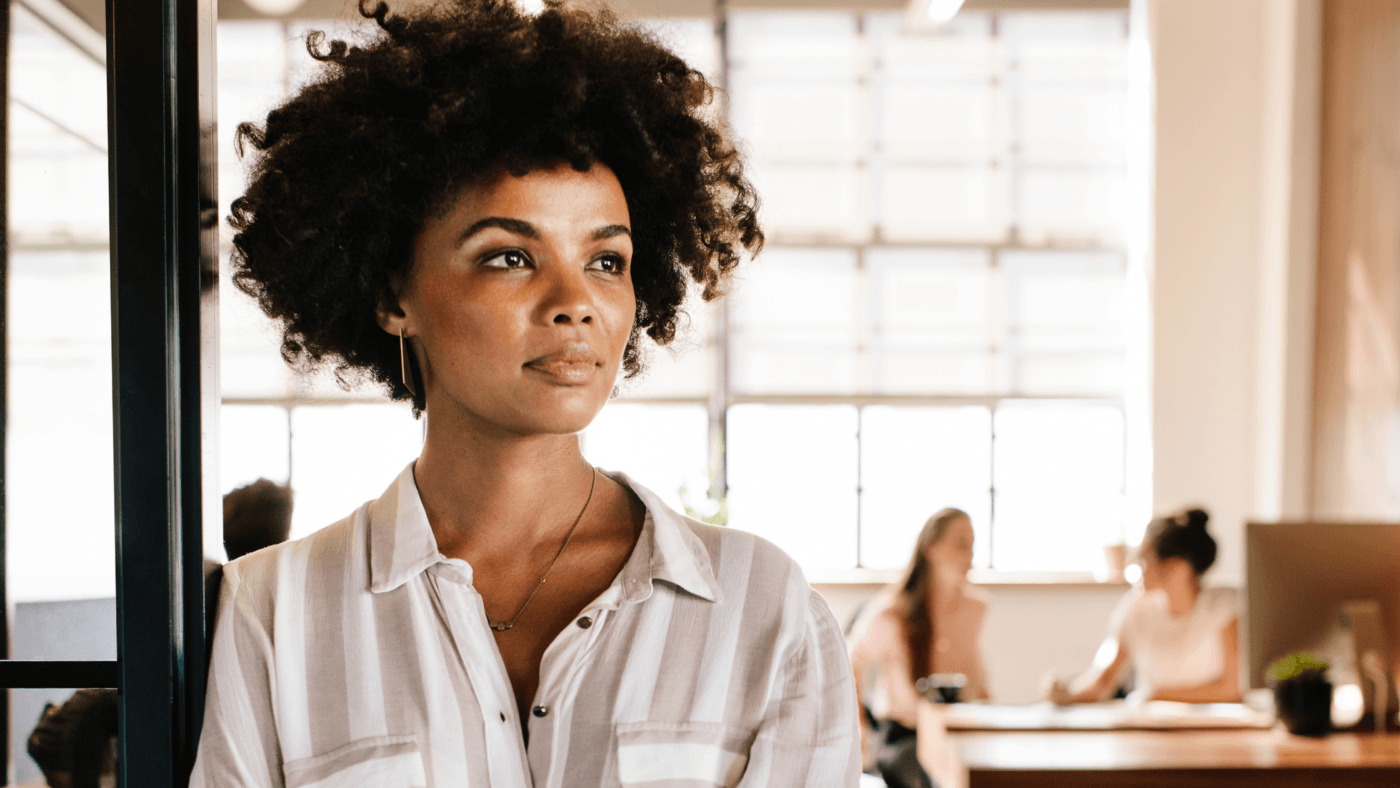 Woman standing while in thought