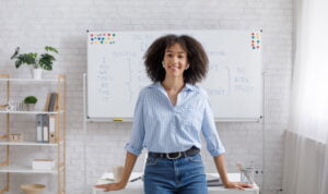 career path: Woman standing in front of desk