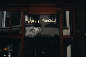 Motivation - Door with words on glass Work in Progress